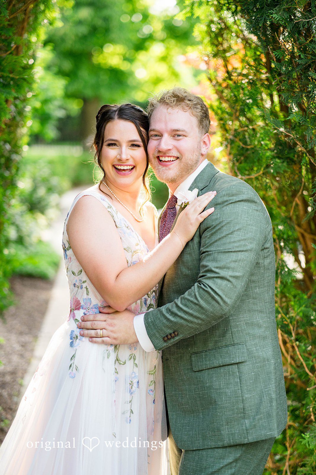 Griffin + Lauren Couple smiling together in the garden