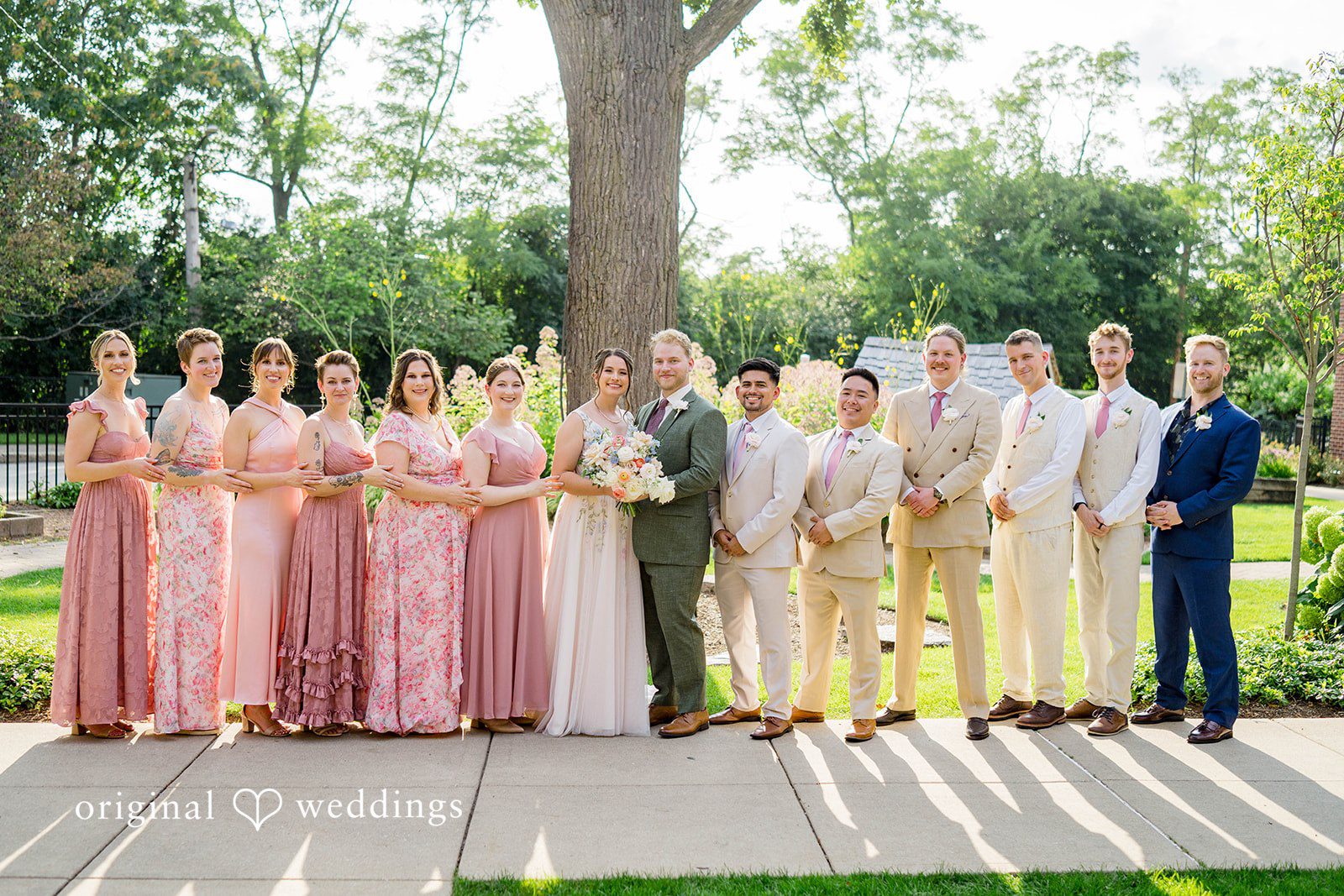 Griffin + Lauren Wedding party lined up in the garden at Community House Winnetka