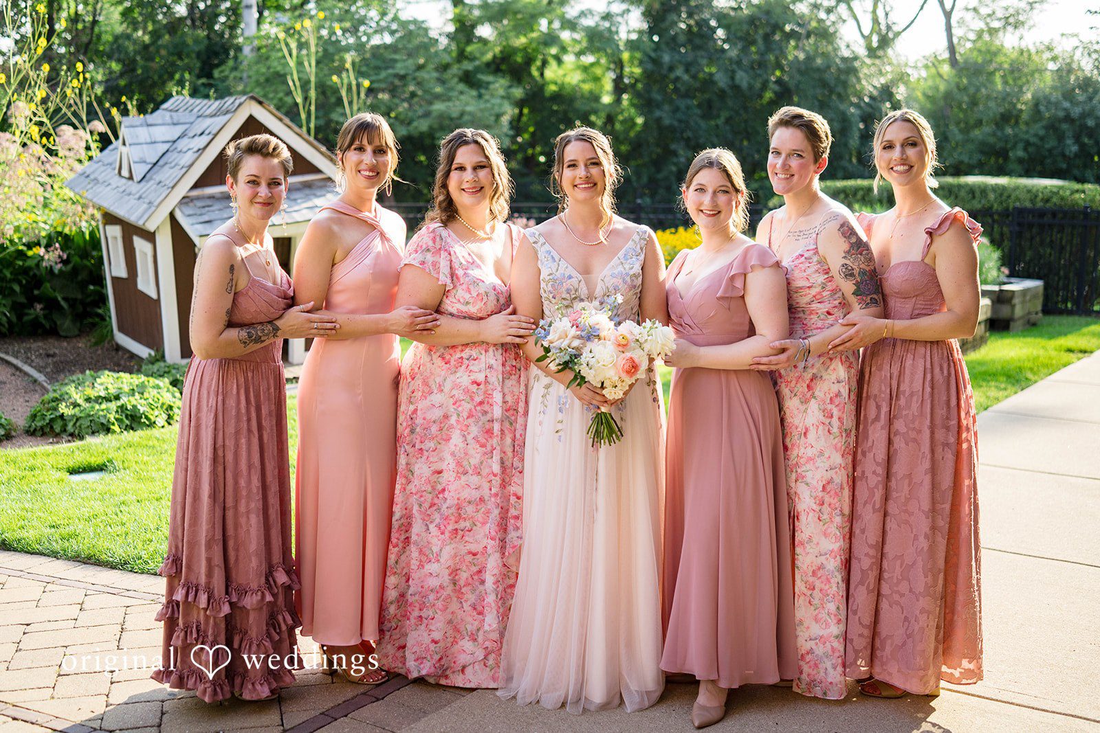 Griffin + Lauren Bride with her bridesmaids in the garden at Community House Winnetka