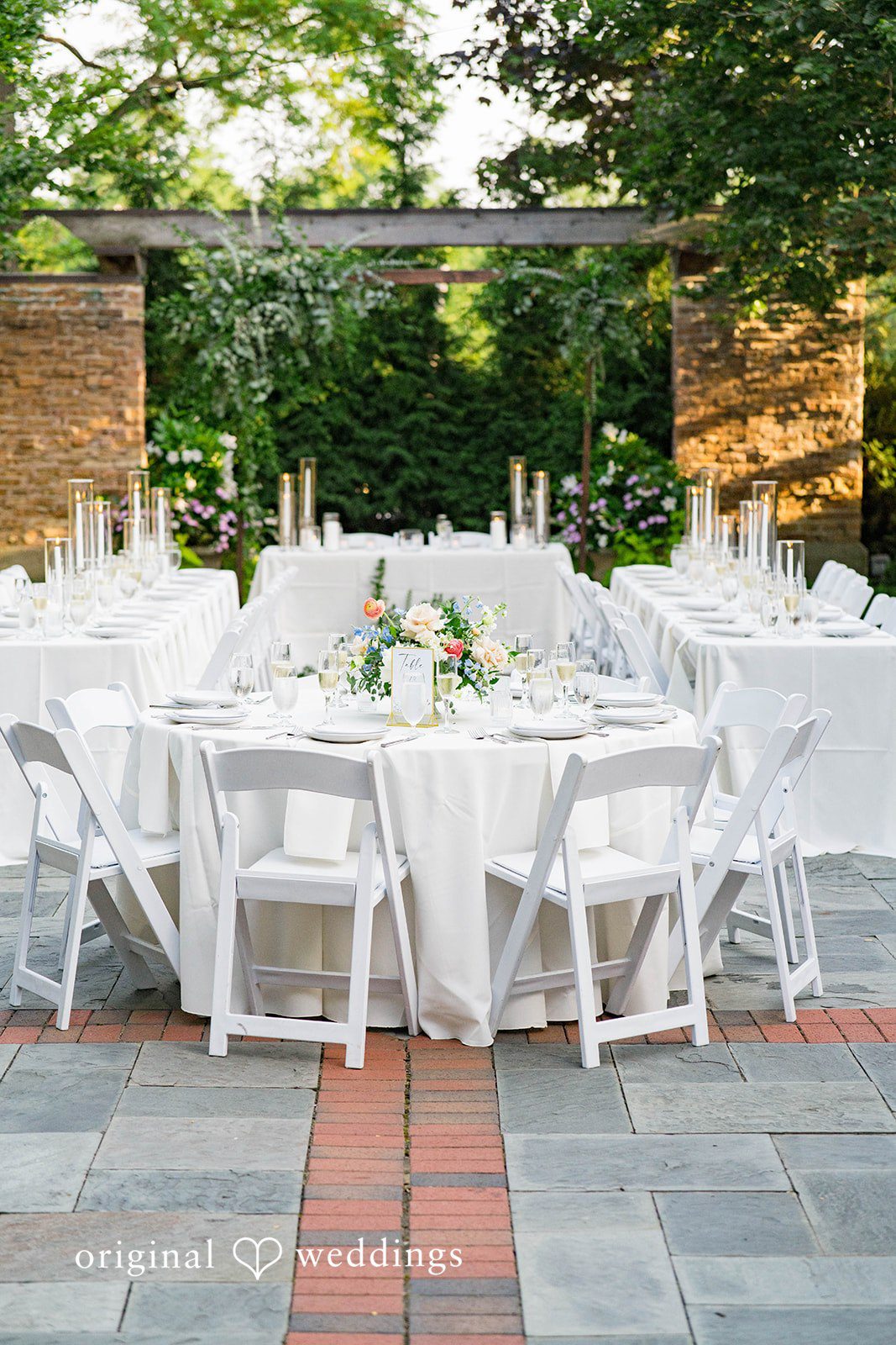 Griffin + Lauren Reception tables set in the courtyard