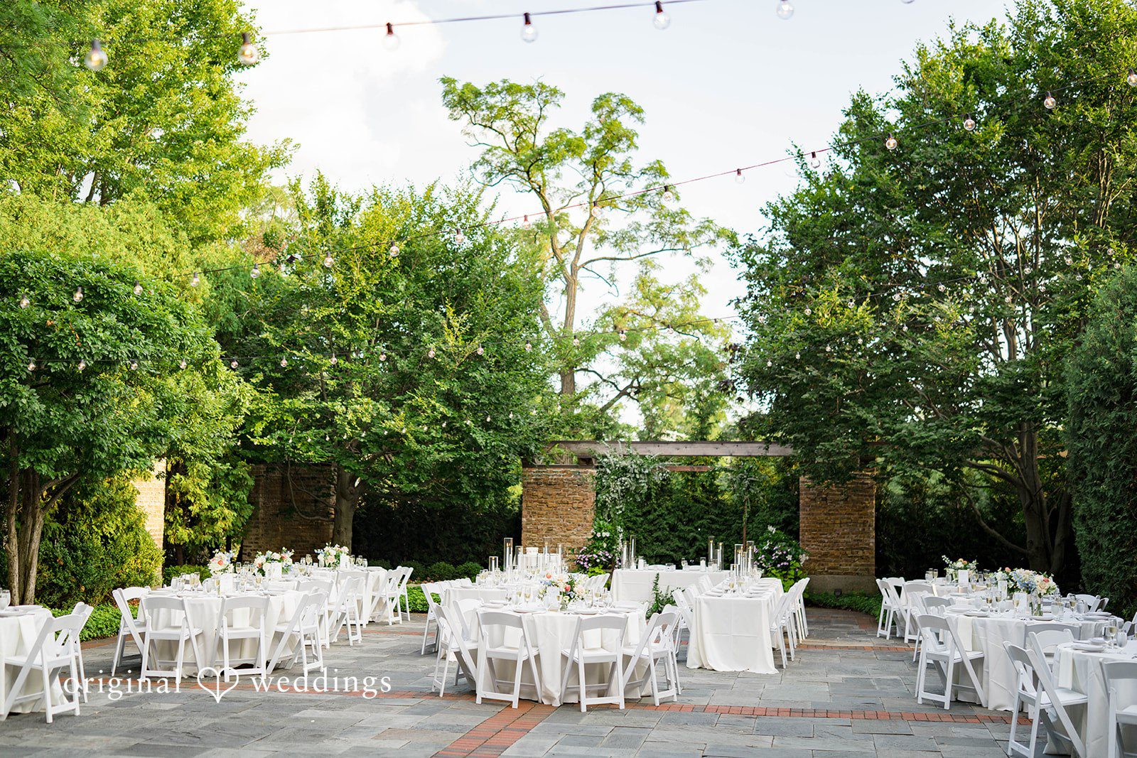 Griffin + Lauren Reception tables set up in the garden at Community House Winnetka