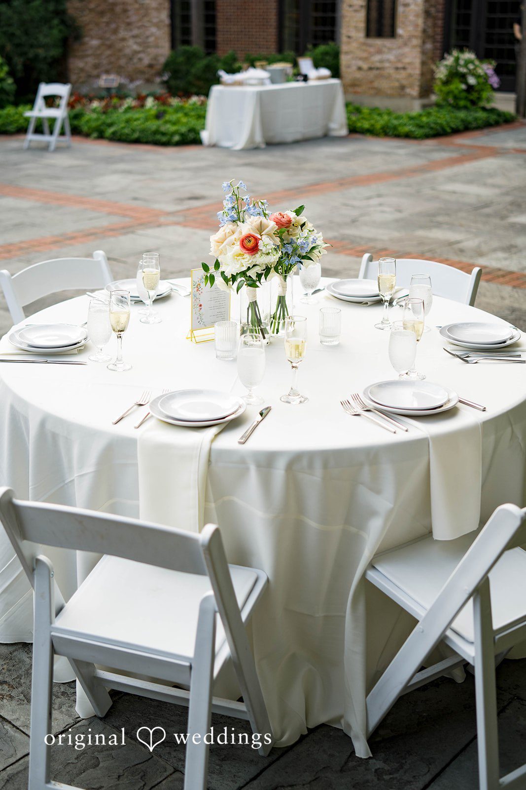 Griffin + Lauren Reception table set with white linens