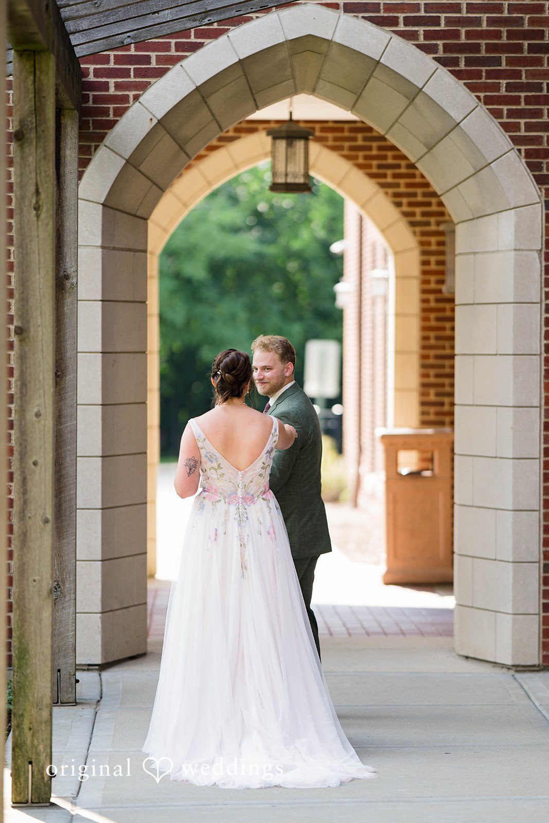 Griffin + Lauren Bride under the stone arch