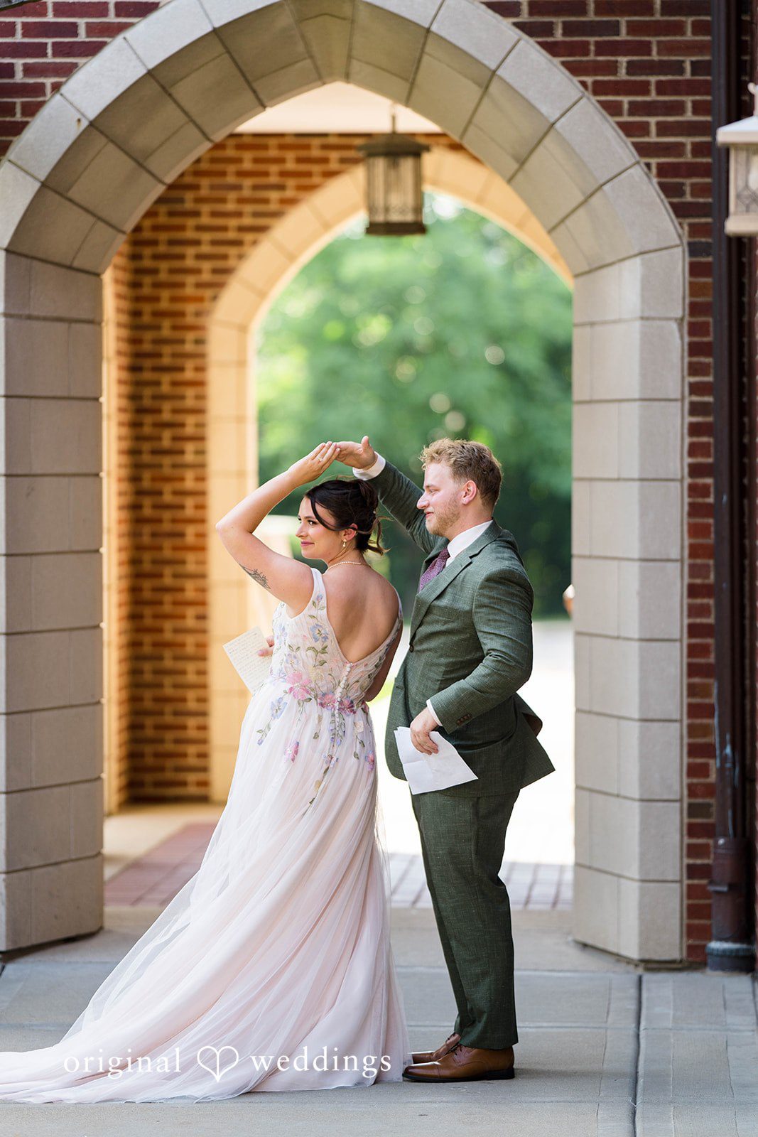 Griffin + Lauren Couple close together in the archway