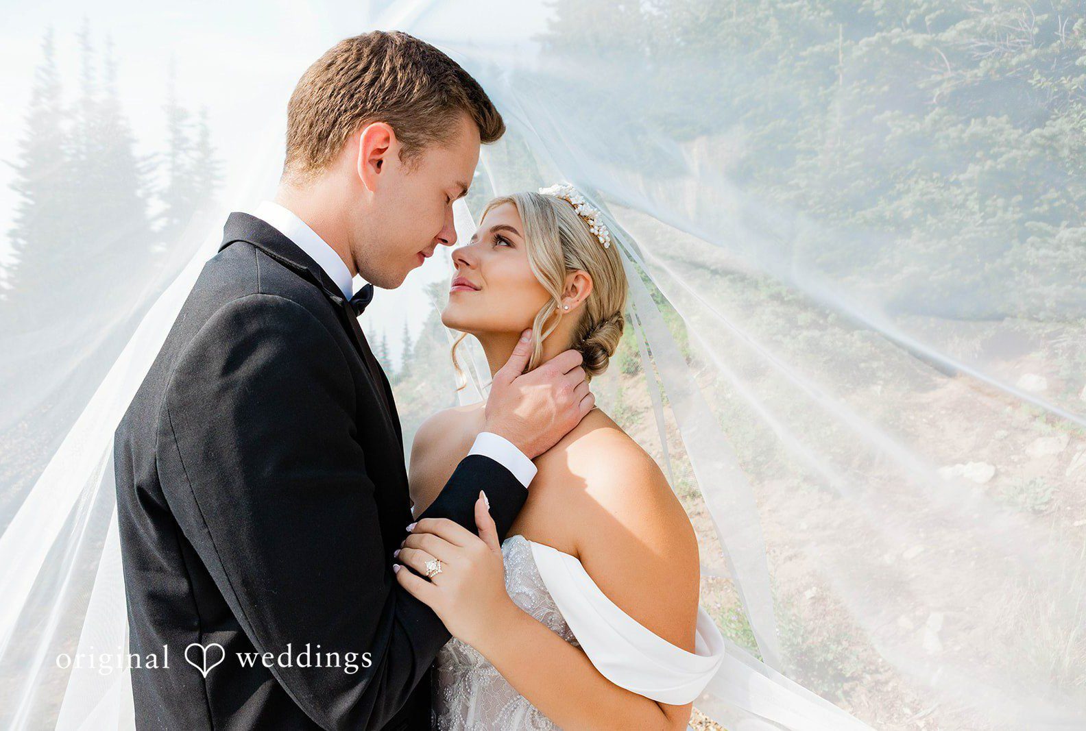 Stunning portrait of couple at Crystal Mountain Resort by Seattle Wedding Photographers from Original Weddings.