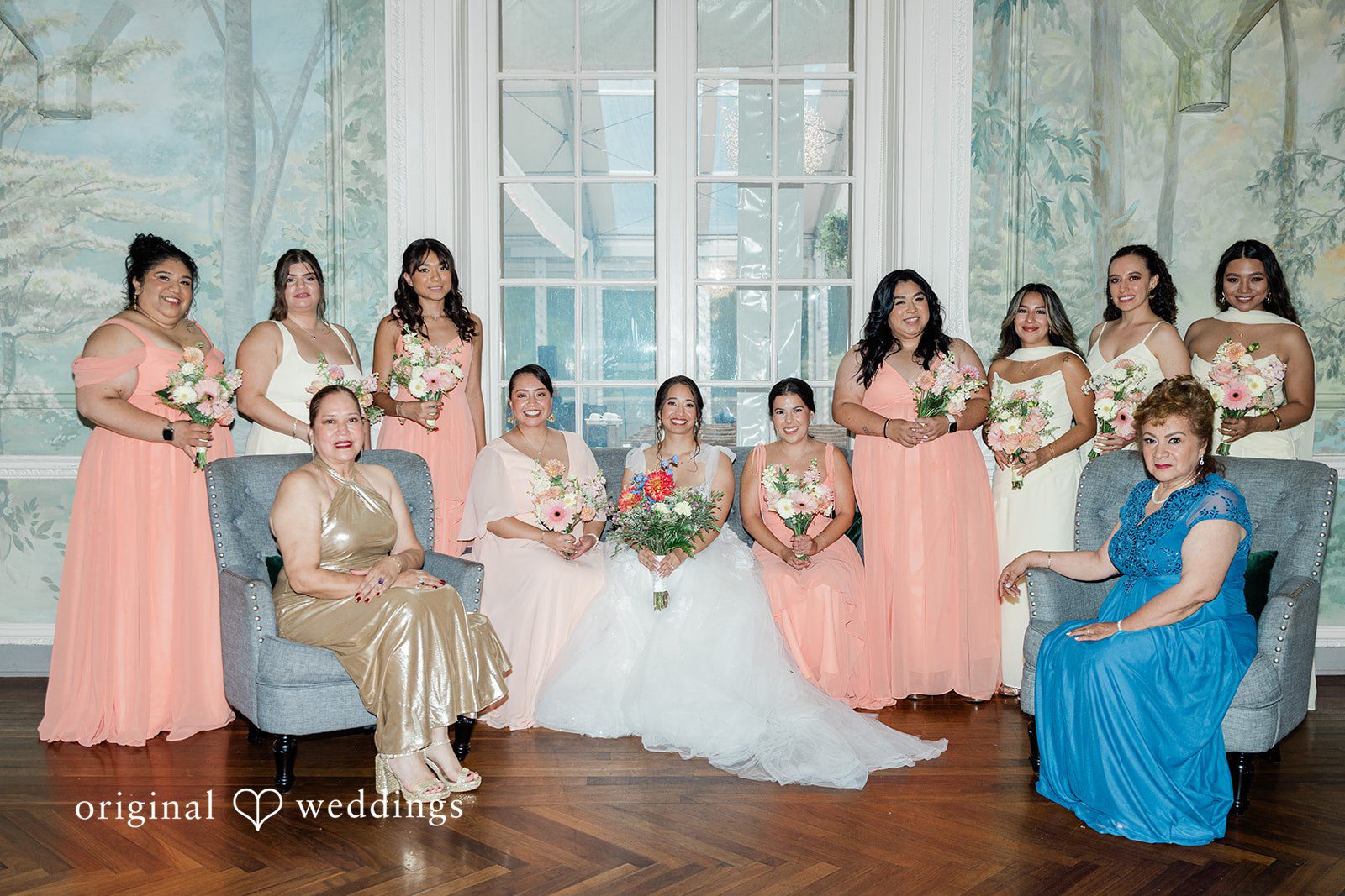 Bride with her bridesmaids inside the hall