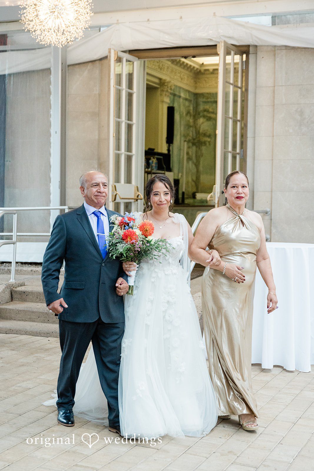 Couple greeting a guest