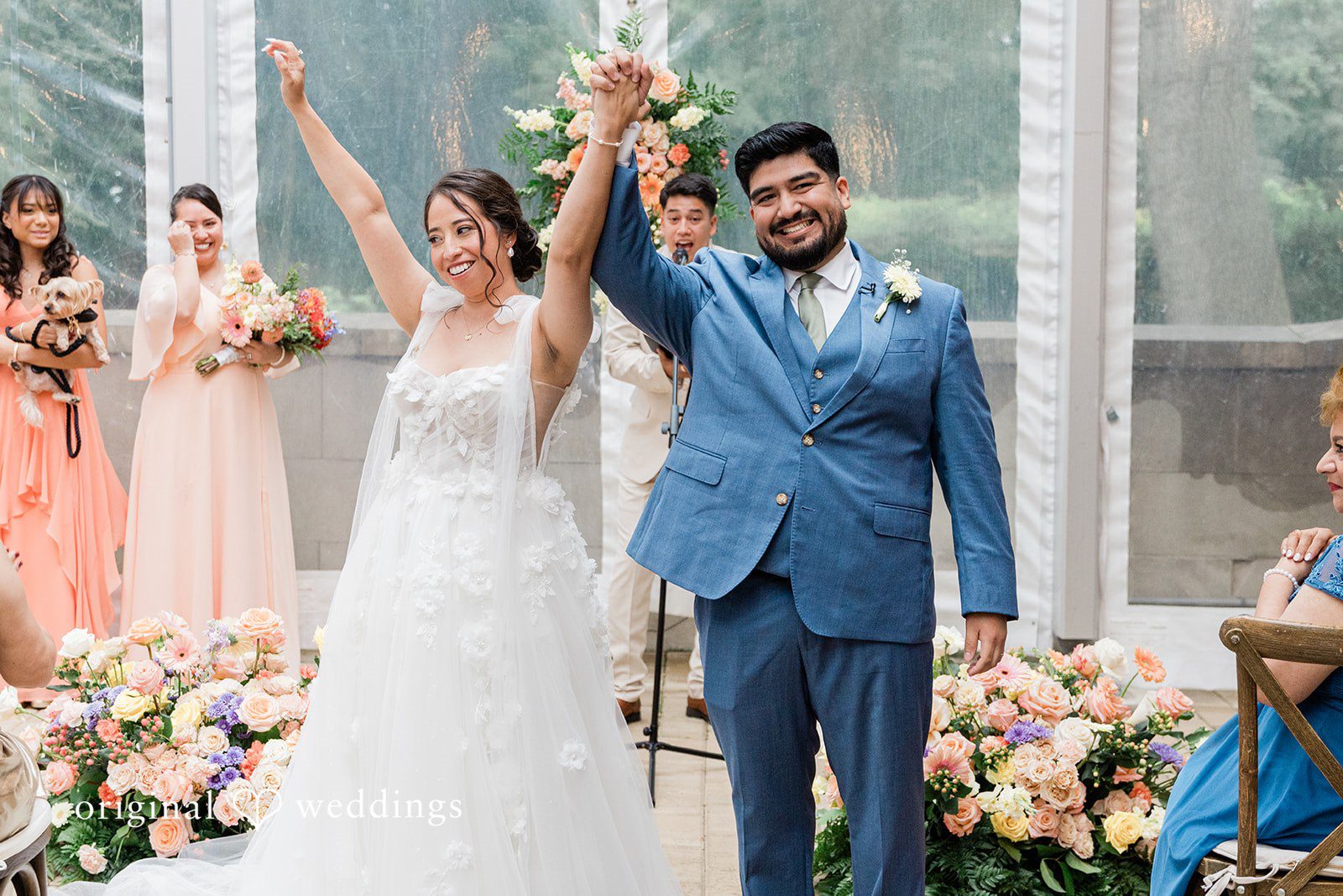Couple cheering after the ceremony