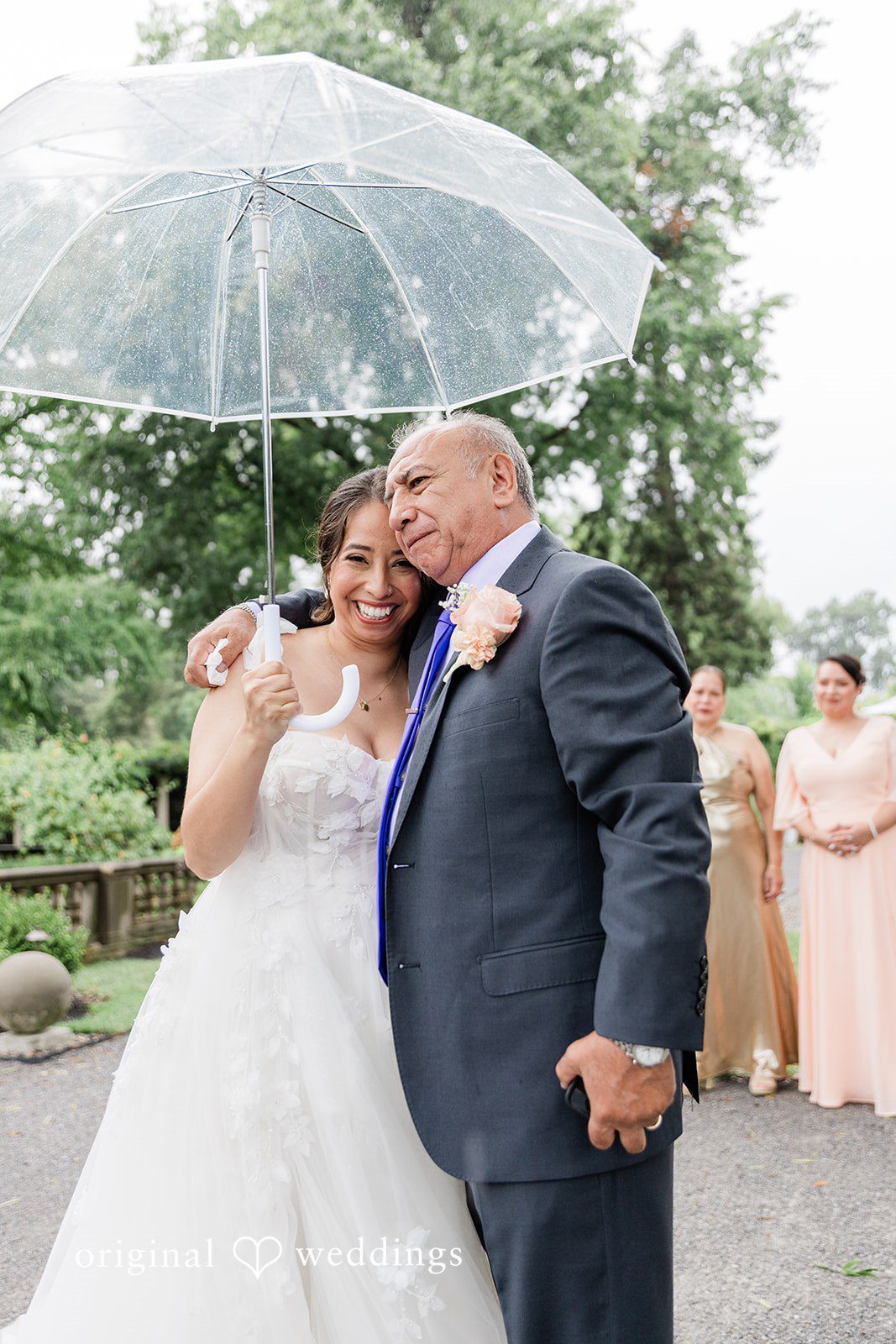 Couple sharing a kiss under an umbrella