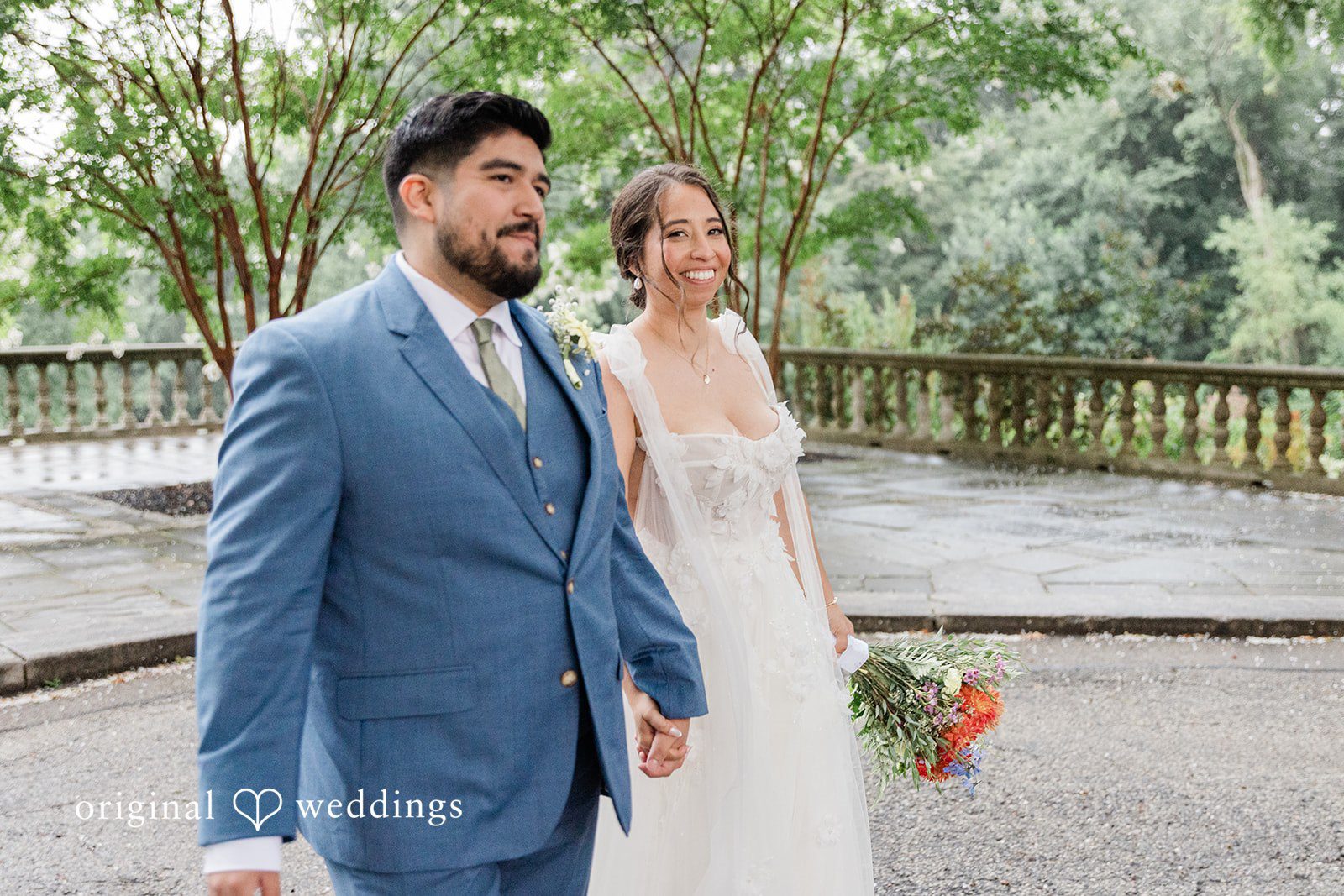 Couple smiling together on the terrace, captured by Philadelphia wedding photographers from Original Weddings at Curtis Arboretum