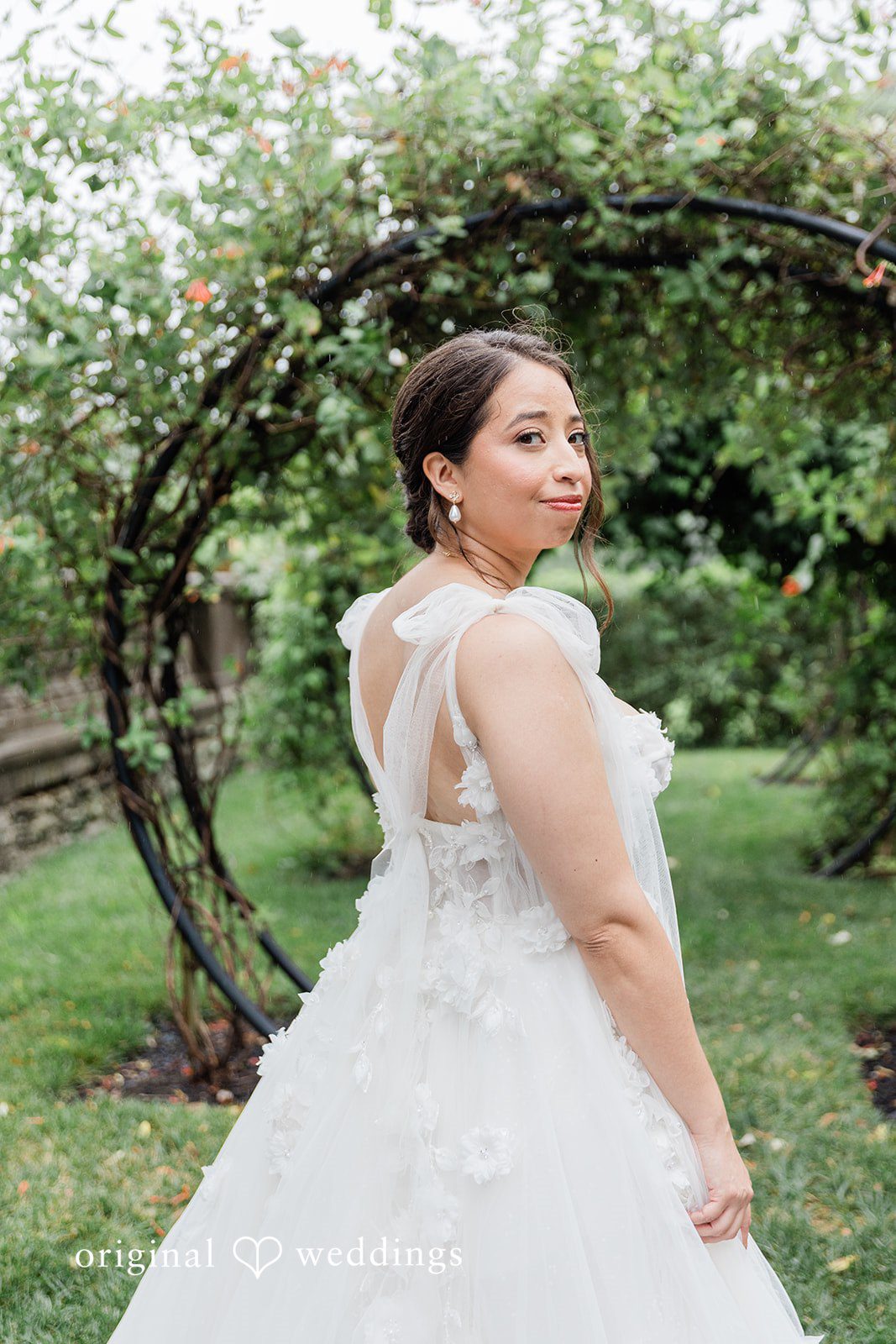 Bride posing in the garden
