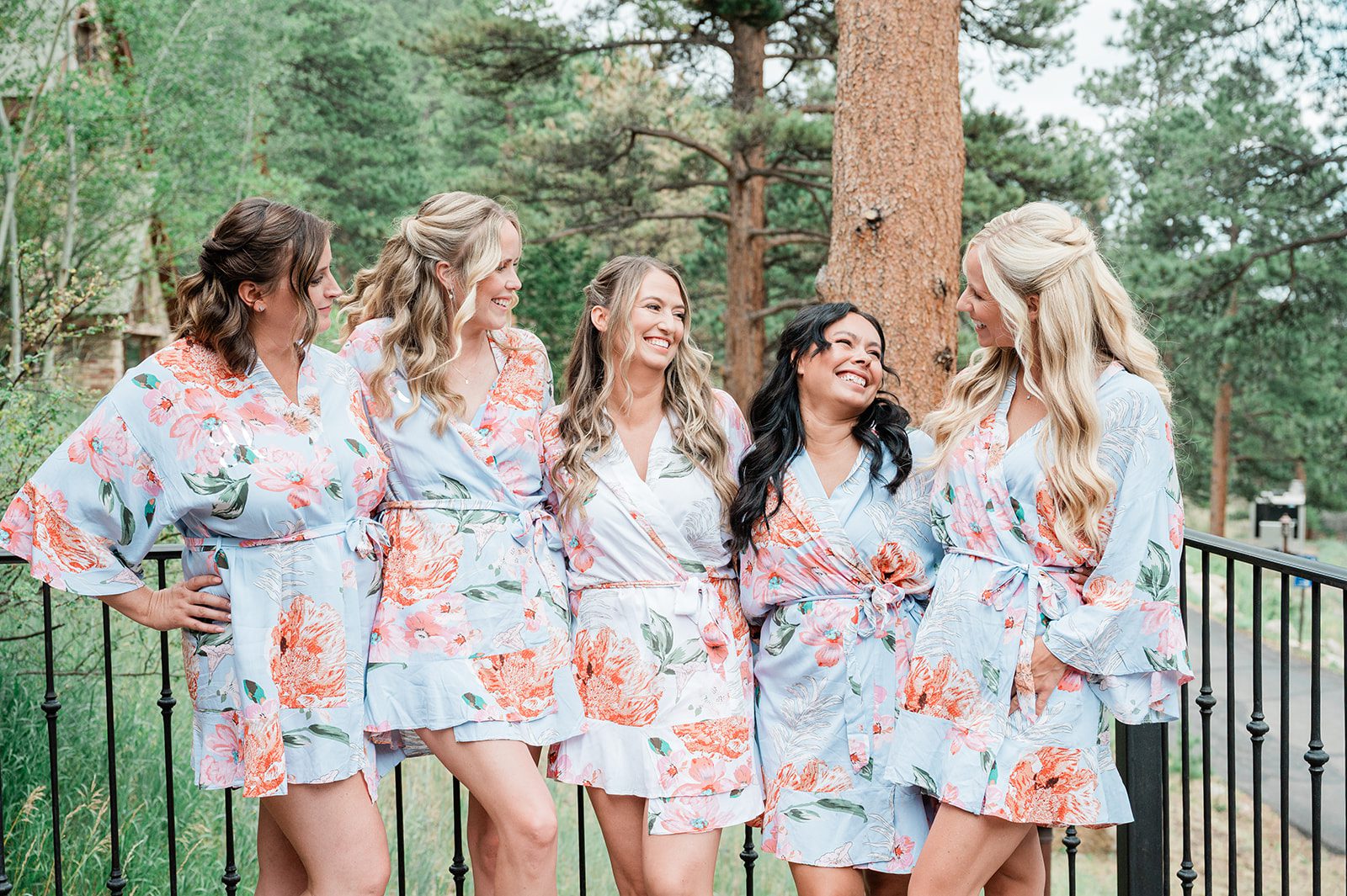 Bride and bridesmaids in matching floral robes