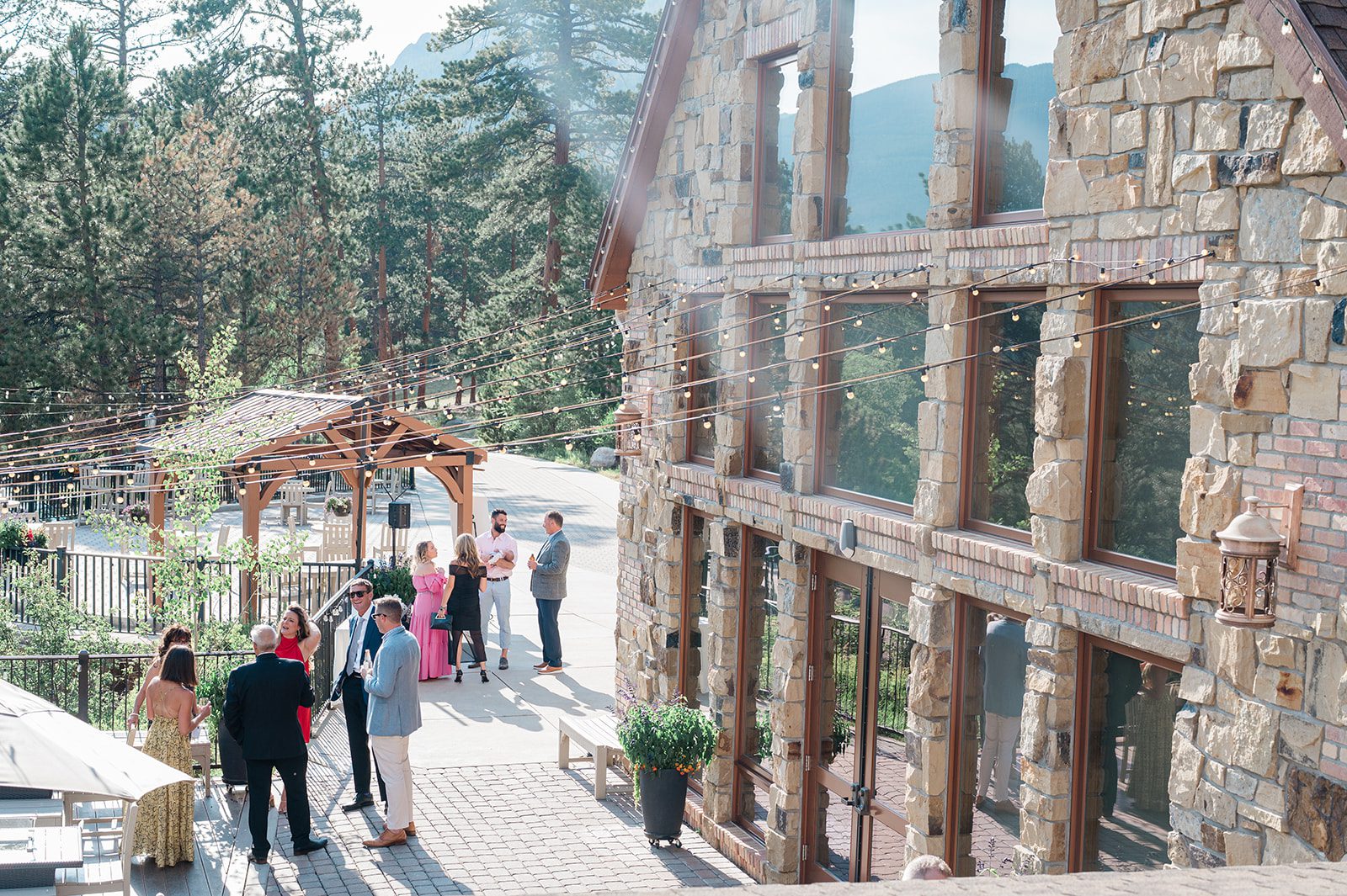Outdoor ceremony site among the pines at Della Terra Mountain Chateau
