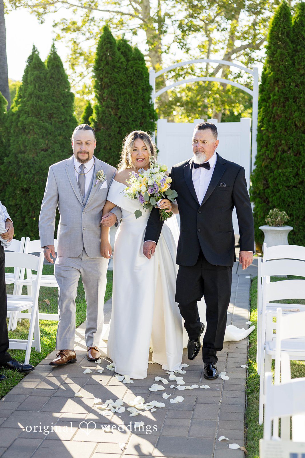 The bride walks down the aisle