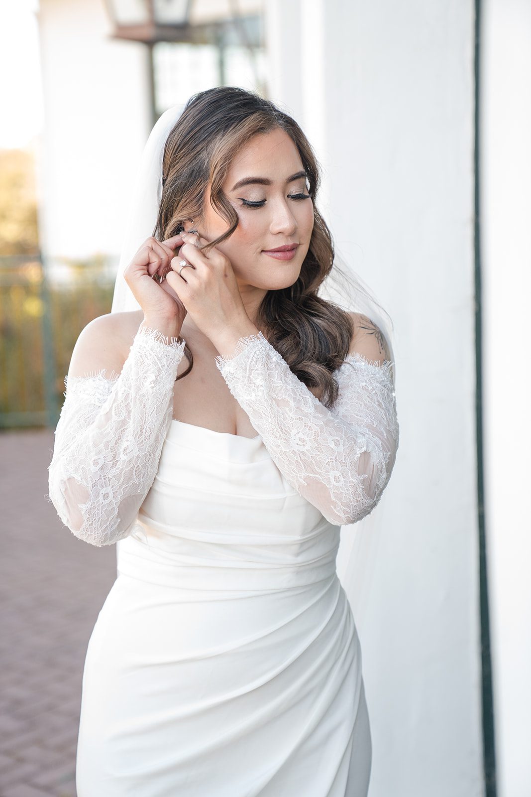 eagle-ridge-timeless-san-francisco-jesse-victoria-jesse-victoria-010-13 Bride fixing her earring before the ceremony
