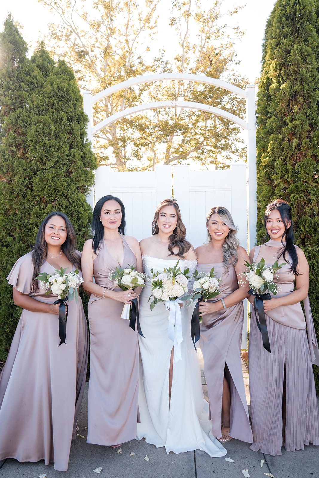 eagle-ridge-timeless-san-francisco-jesse-victoria-jesse-victoria-022-16 Bride with her bridesmaids in mauve gowns