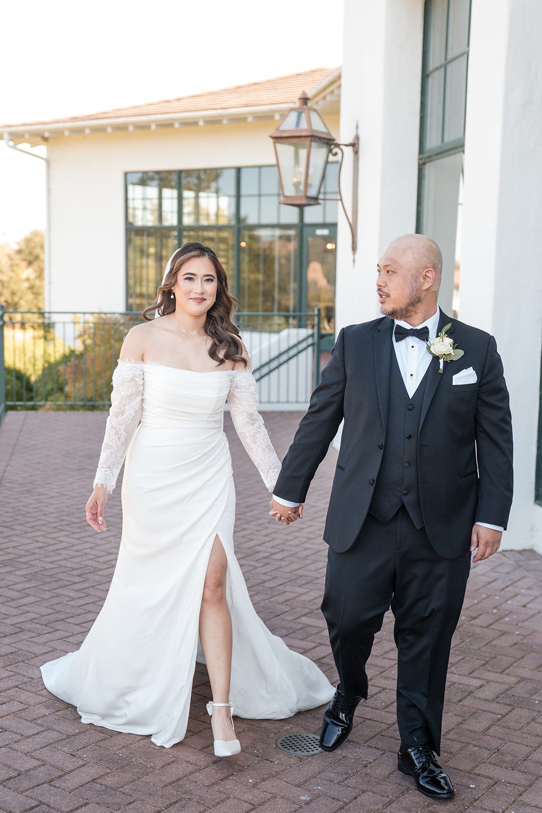 eagle-ridge-timeless-san-francisco-jesse-victoria-jesse-victoria-027-44 Bride and groom walking hand in hand at Eagle Ridge