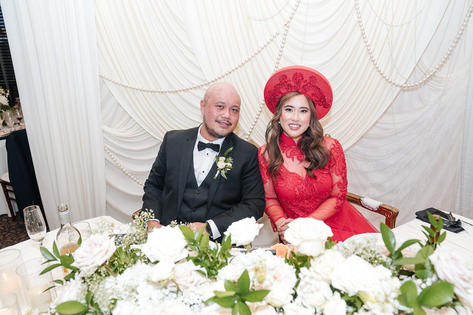 eagle-ridge-timeless-san-francisco-jesse-victoria-jesse-victoria-037-25 Couple in traditional red attire for the tea ceremony