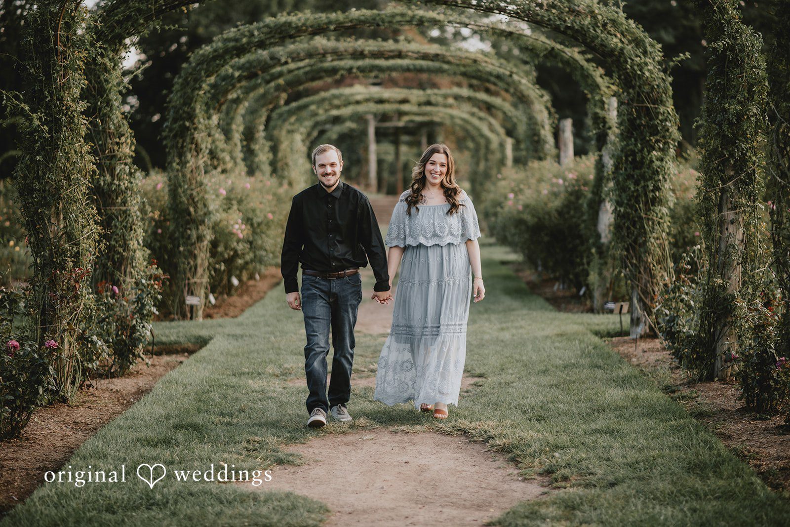 September 24, 2026 – Kaitlynn & Samuel – (ID-5685) Couple walking under the rose arbor at Elizabeth Park