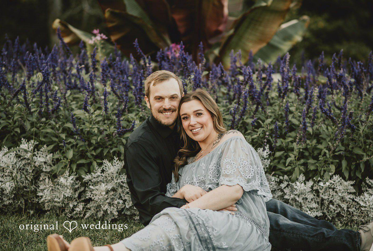 Couple relaxing in the purple flower garden, Engagement Photography Services by Original Weddings at Elizabeth Park