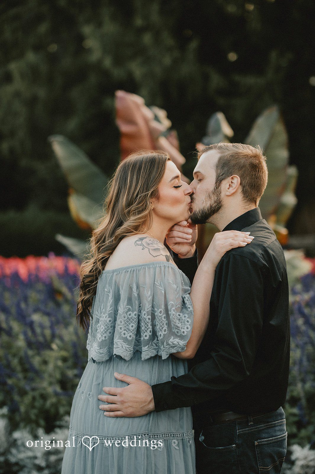 September 24, 2026 – Kaitlynn & Samuel – (ID-5685) Couple kissing among tropical leaves at Elizabeth Park