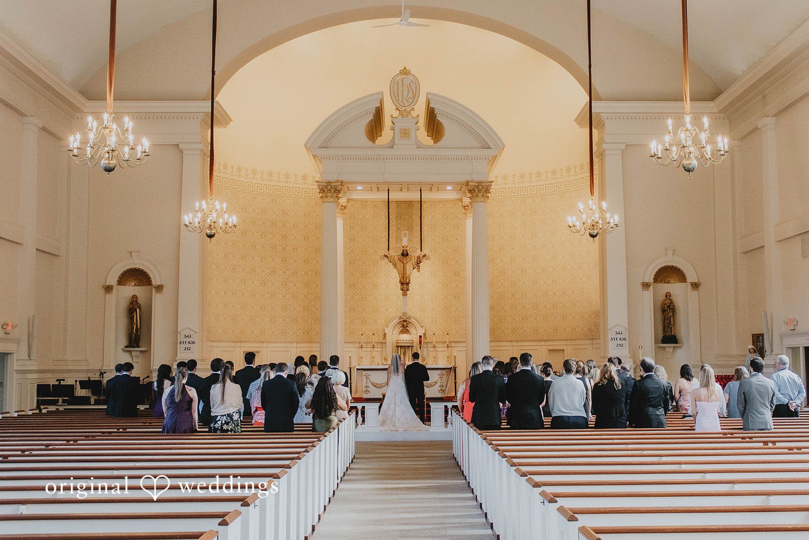 Alexa + Frank Wide view of the Catholic ceremony inside the church