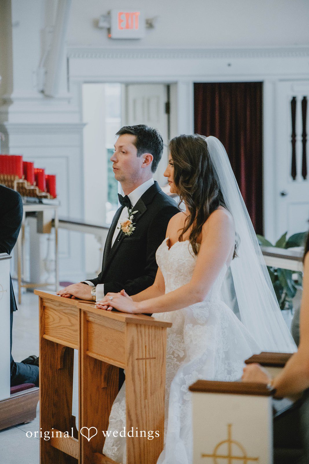 Alexa + Frank Couple at the altar during a ceremony reading