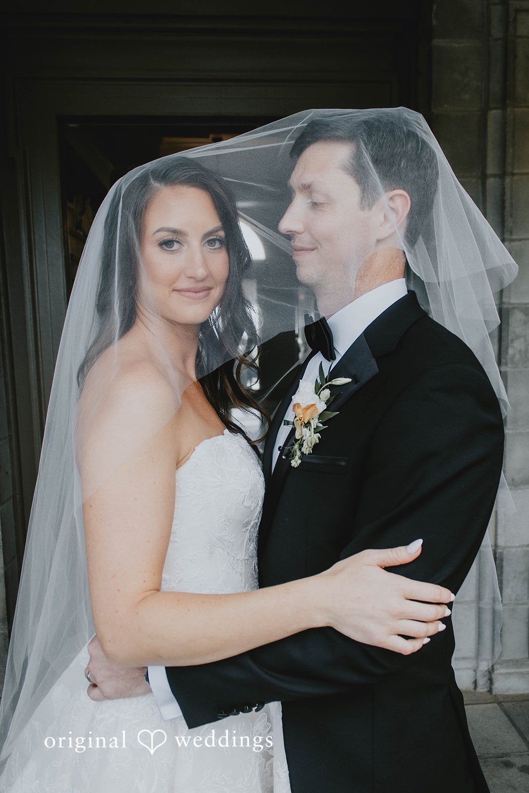 Alexa + Frank Couple sharing a tender moment under the veil