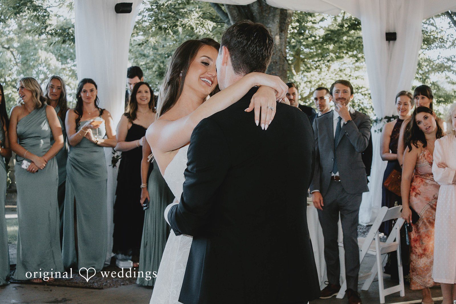 Alexa + Frank Bride and groom with the bridesmaids in sage green