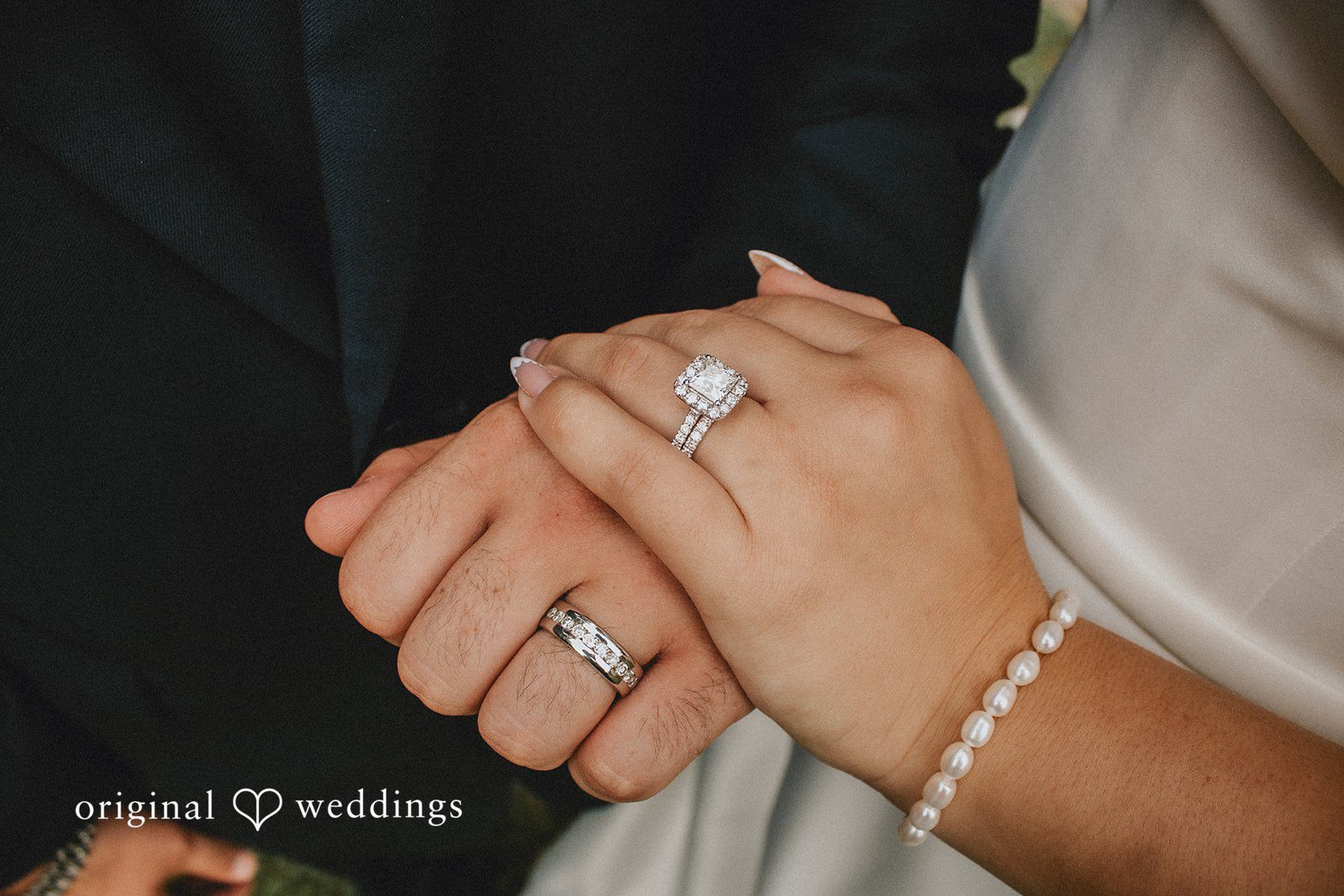 September 19, 2026 – Sarah & Christopher – (ID-4569) A close-up shot focusing on the bride's hand showing off her wedding ring.