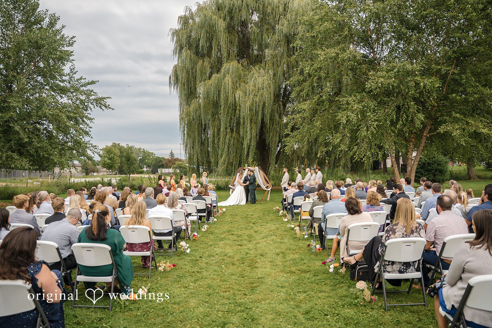 Alexis + Alex Ceremony for Alexis and Alex at Fireman's Park Pavilion, photographed by Milwaukee wedding photographers