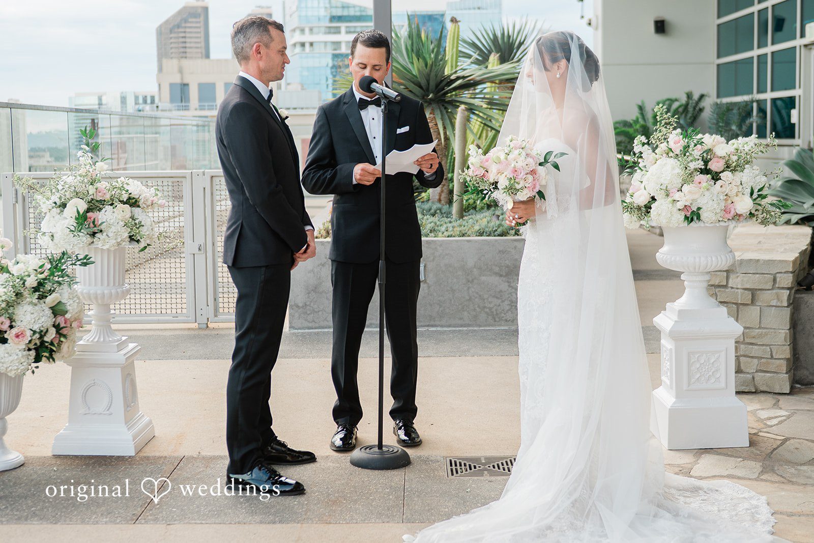 Victoire and Brett with the officiant