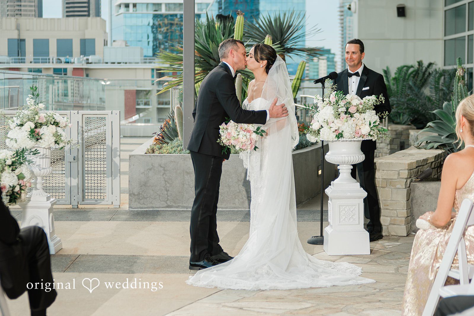First kiss at the Fleurette rooftop ceremony