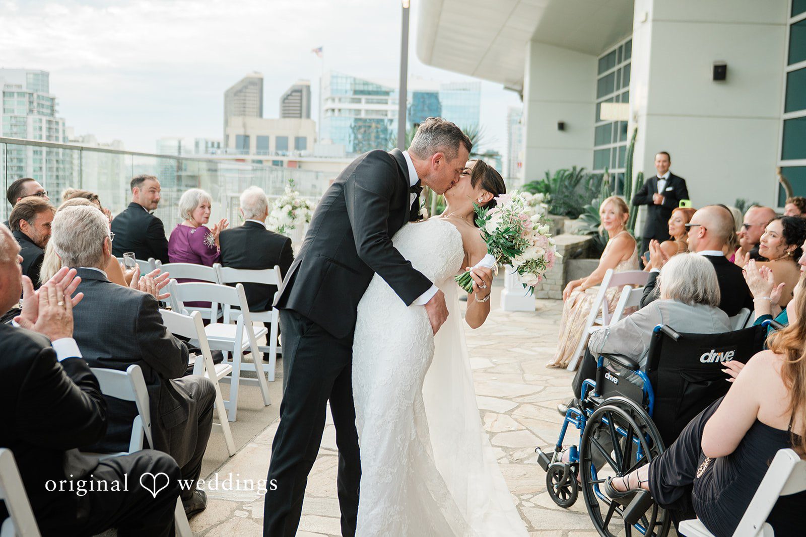 Newlyweds celebrating with guests after the ceremony