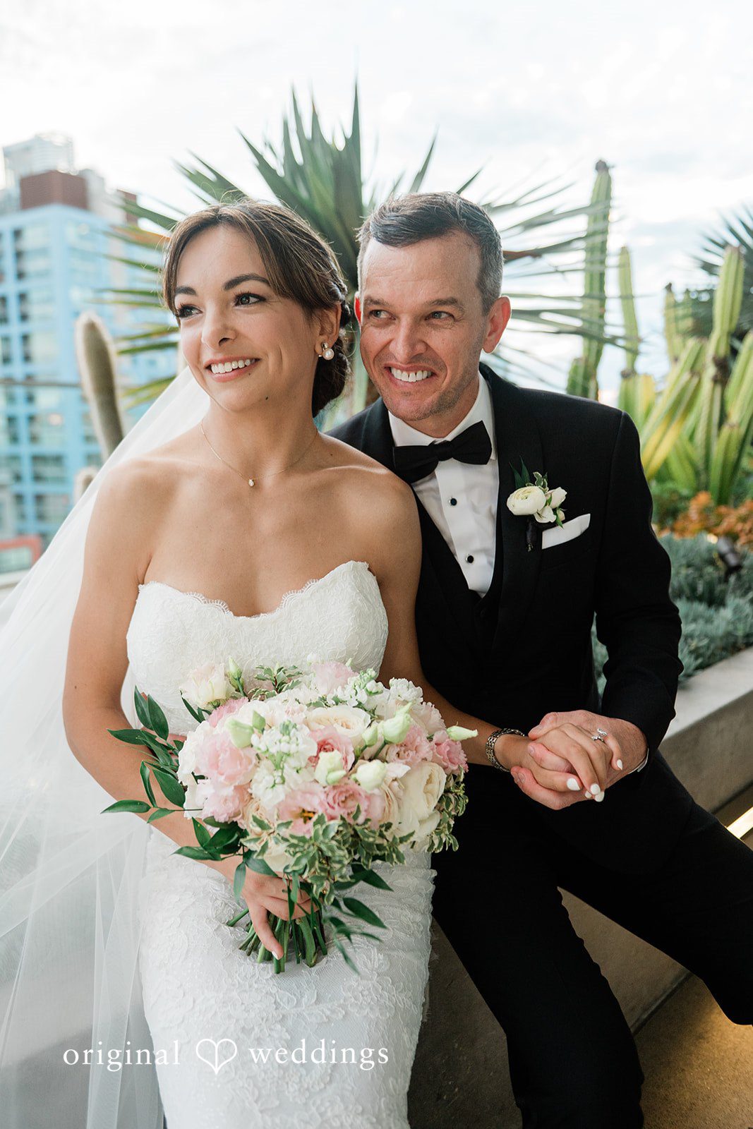 Couple portrait with her bouquet at Fleurette
