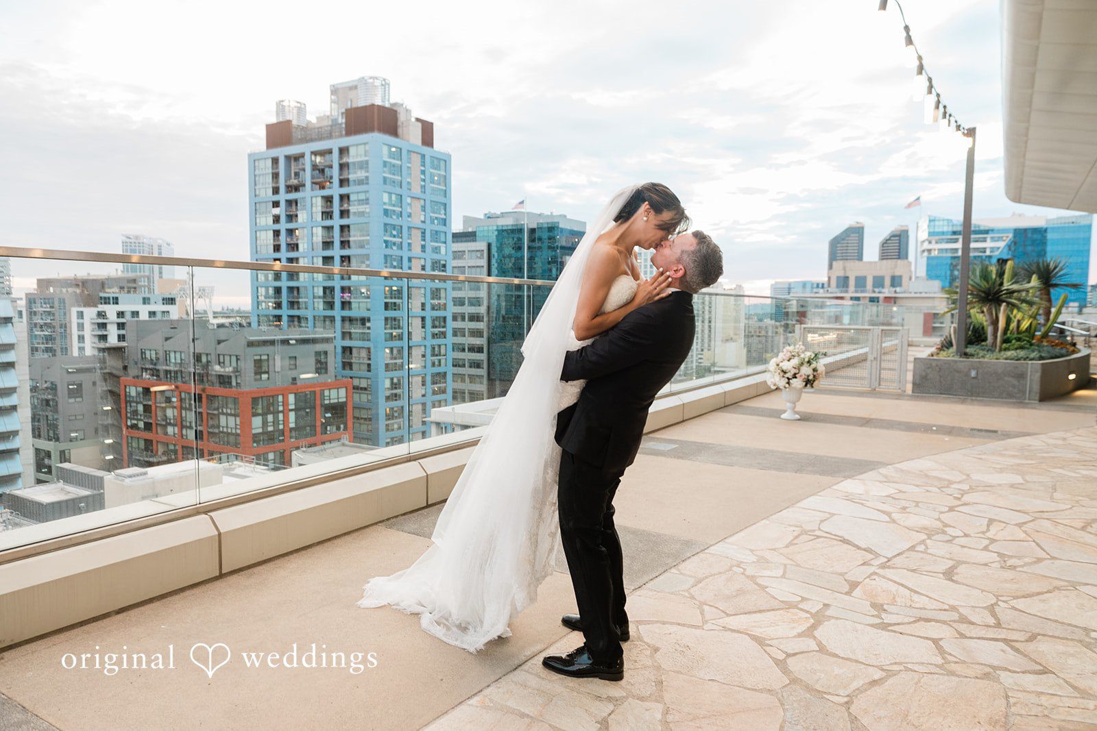 Bride and groom on the rooftop terrace