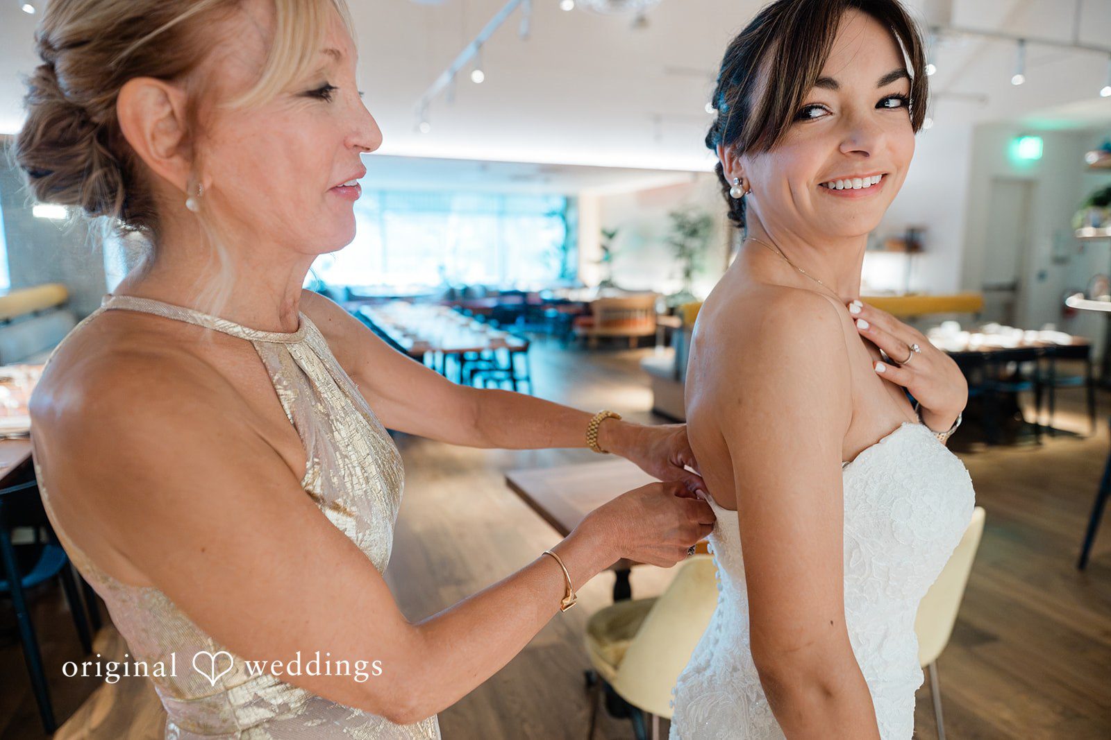Bride getting ready with her mother