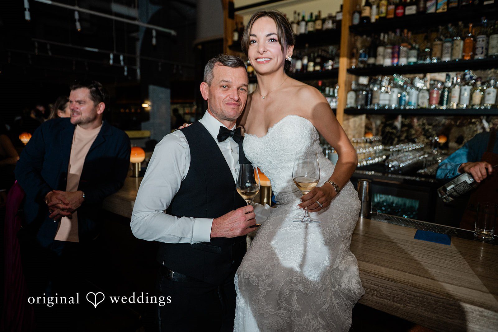 Bride and groom at the bar during the reception