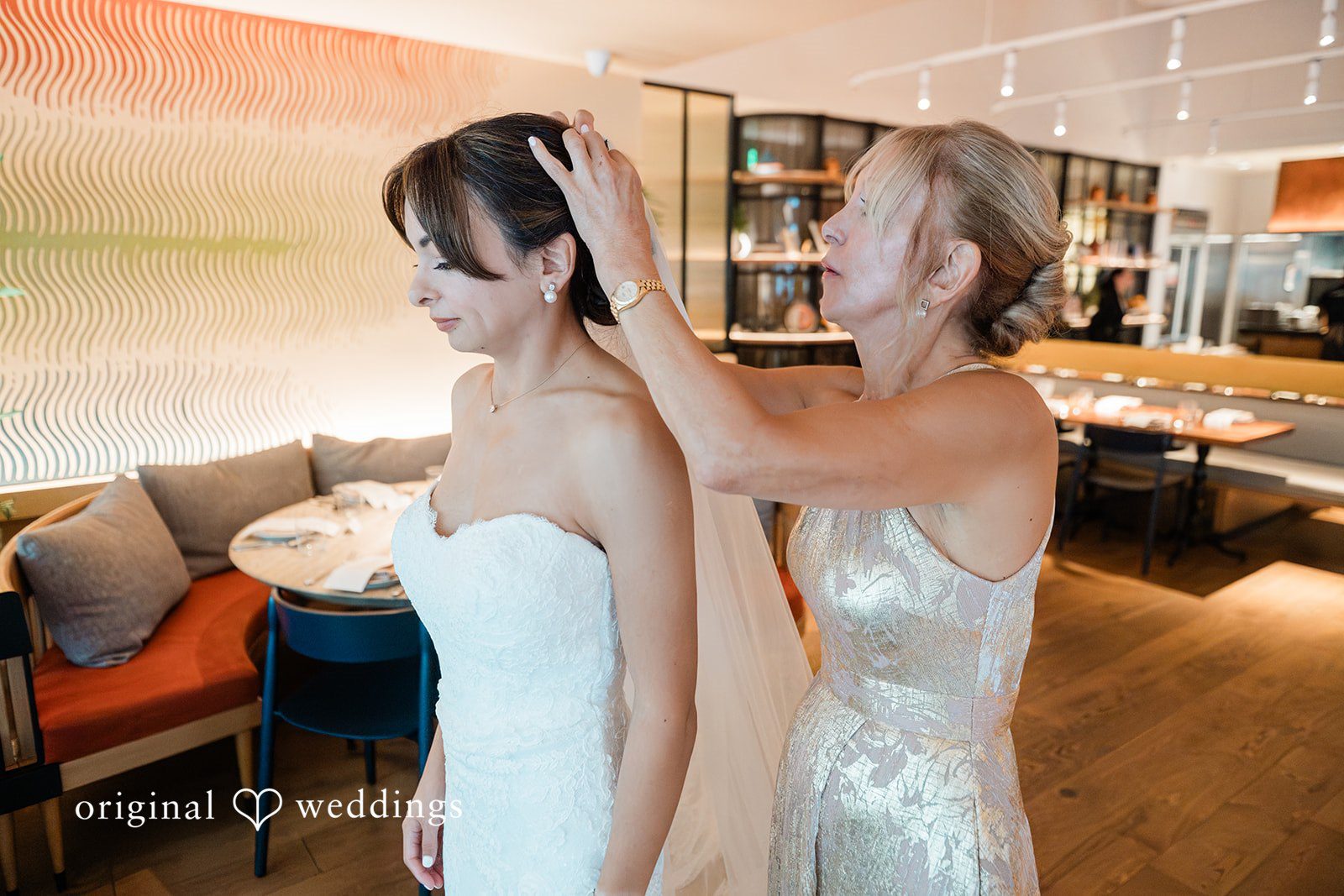 Veil placed on the bride before the ceremony at Fleurette