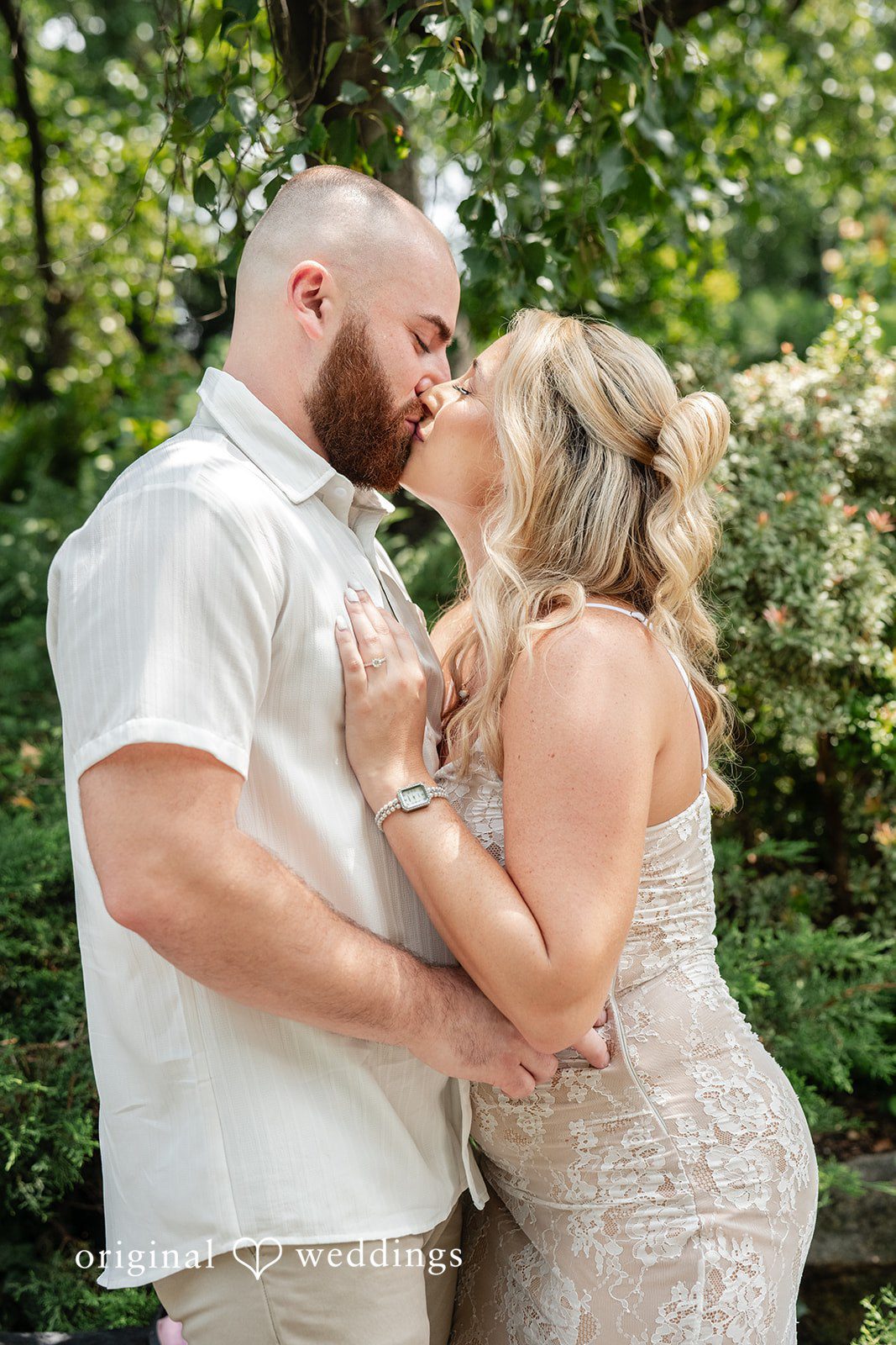 Jackie + Will The couple shares a kiss