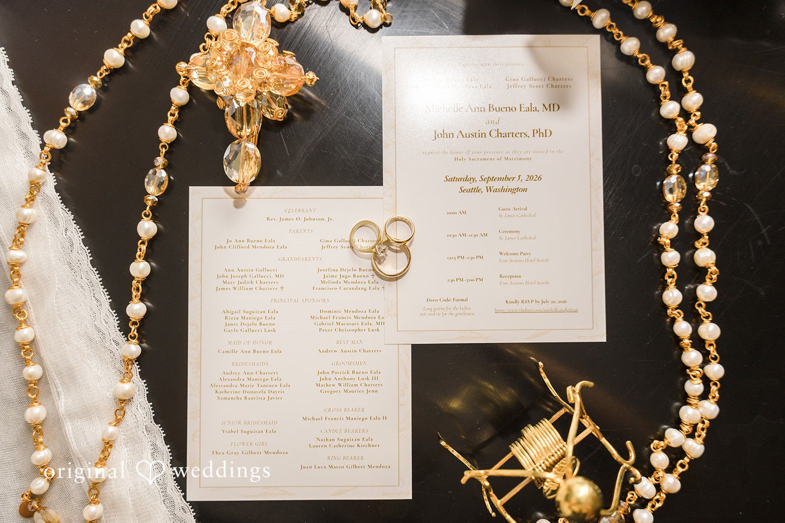 John + Michelle Elegant wedding stationery showcasing detailed typography and a gold wax seal.