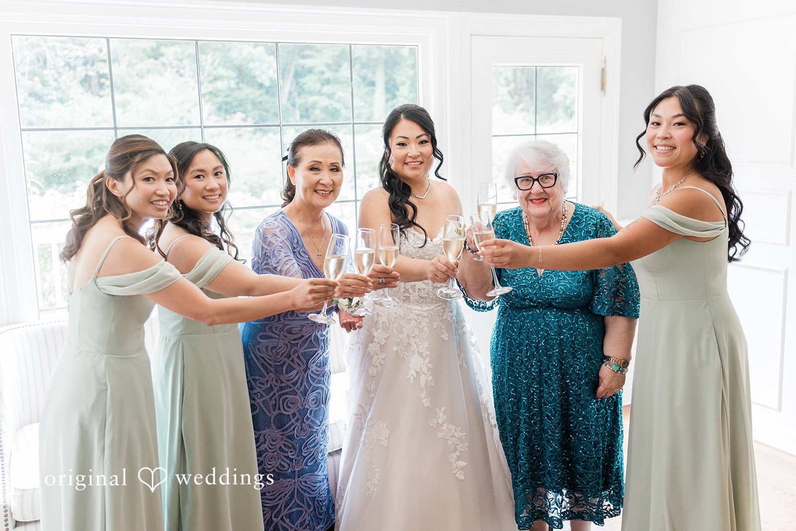 Kim + Keven A group of bridesmaids posing together.