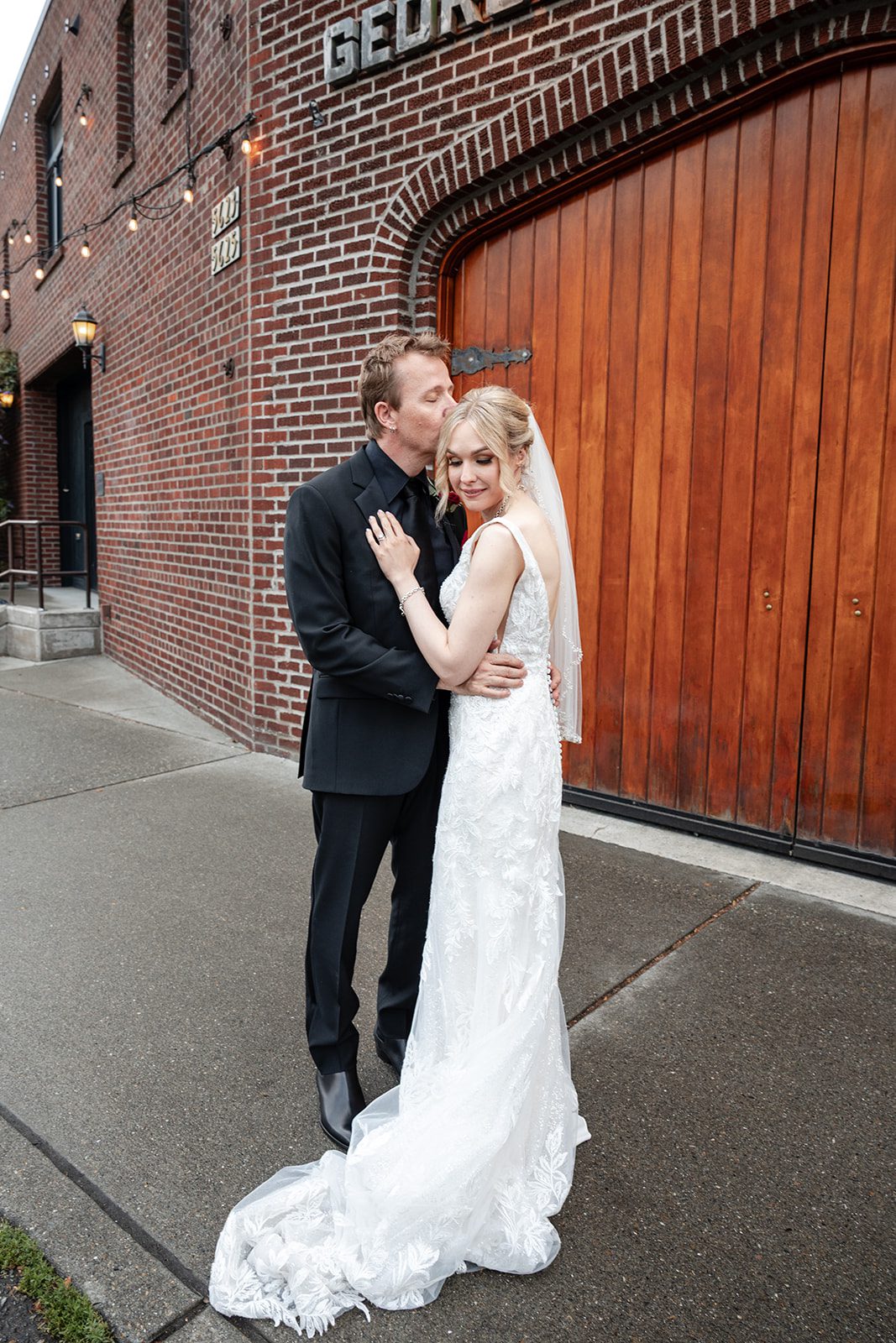 Couple by the brick wall Couple by the brick wall