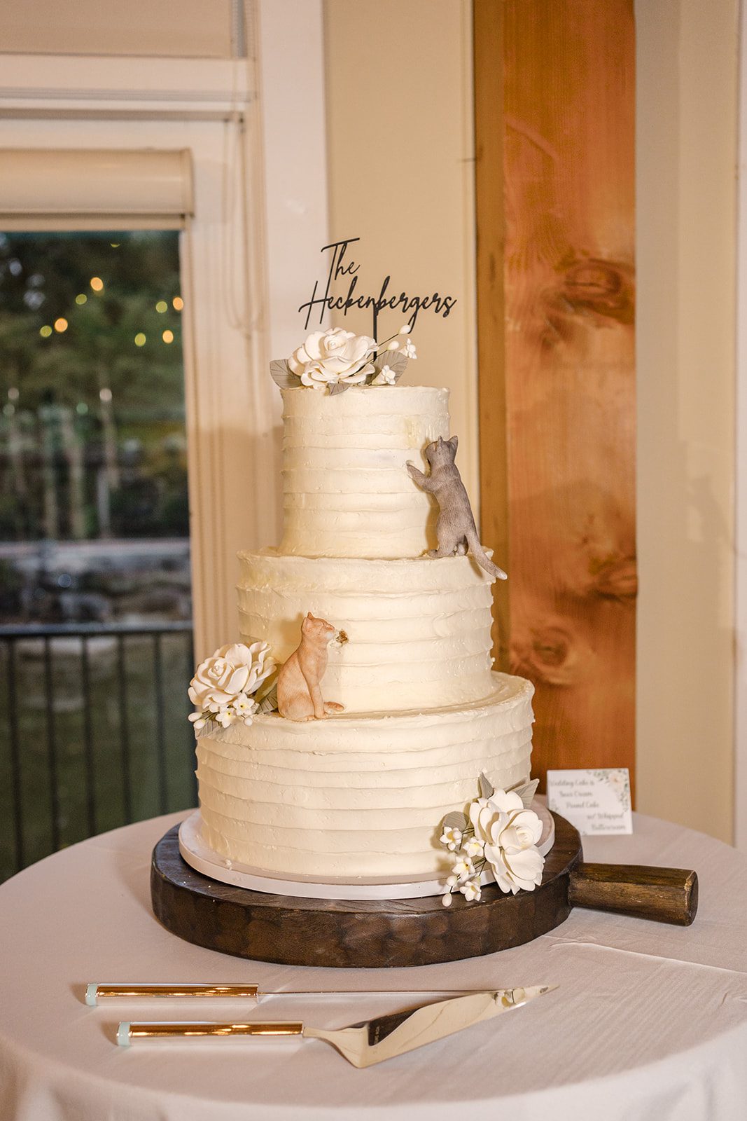 Four tier wedding cake with white flowers