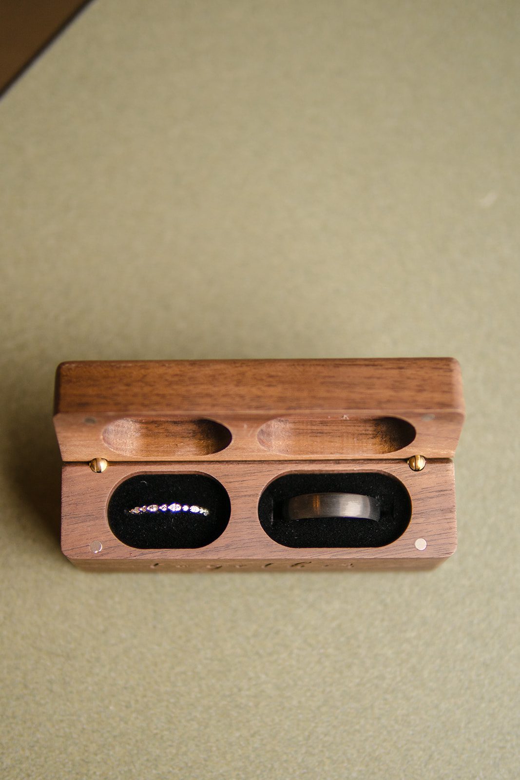 Wedding rings in a wooden ring box