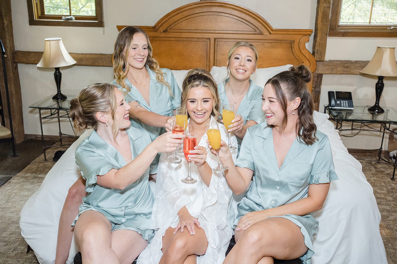 Bride with her bridesmaids in matching robes
