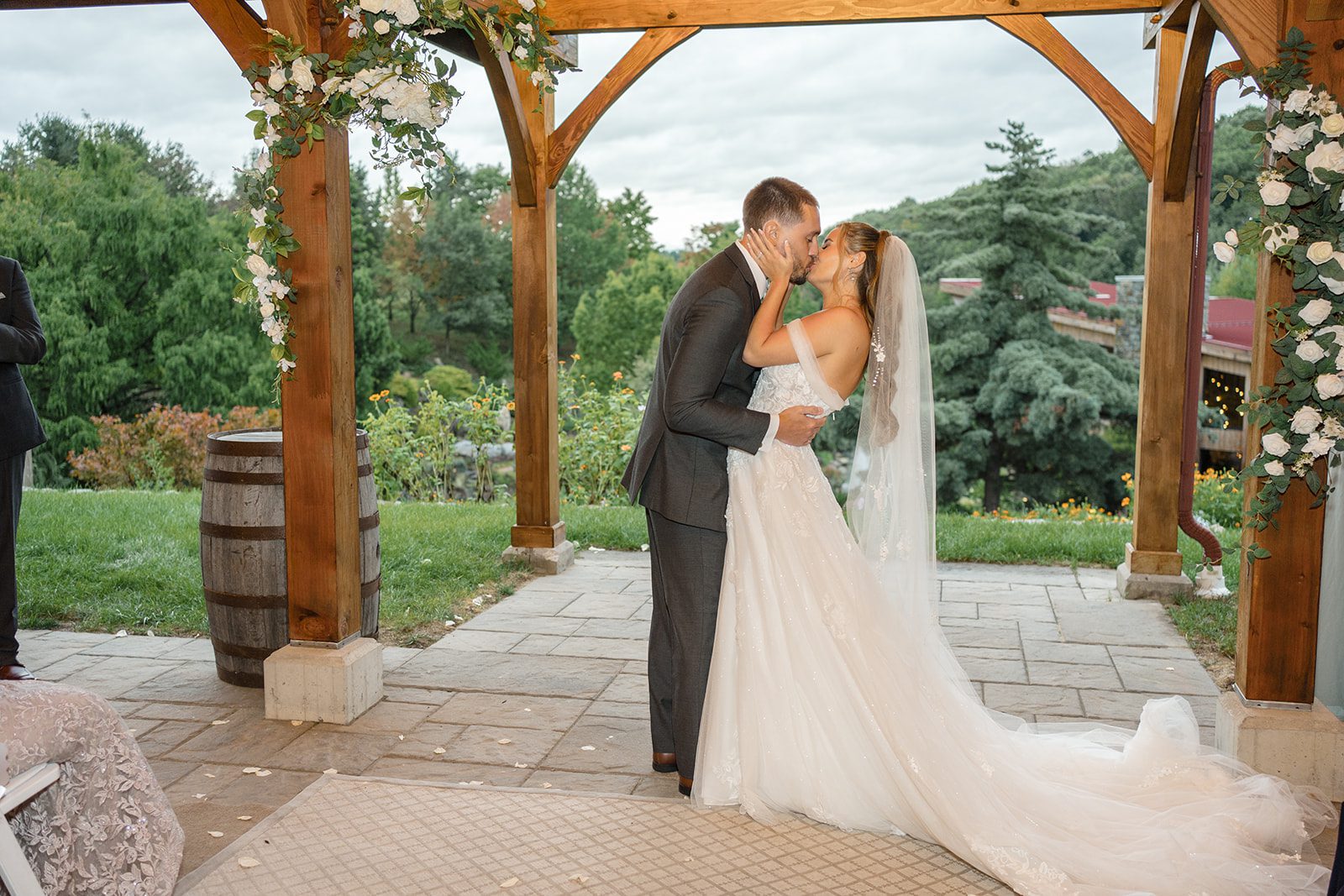 First kiss under the timber pavilion
