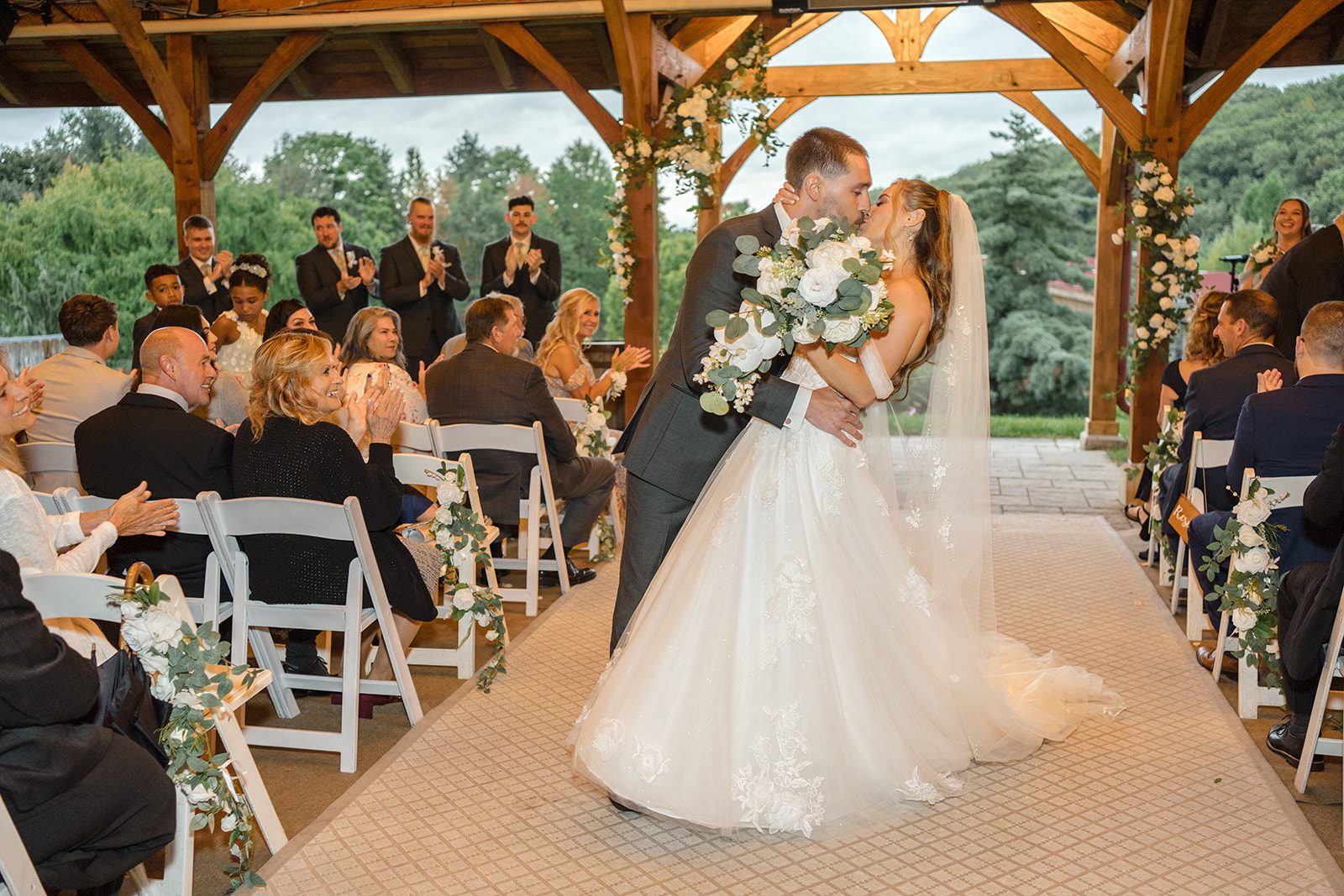 Couple walking back down the aisle at Glasbern