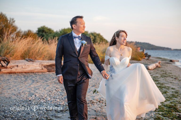Jason and Kristen’s wedding portrait at Golden Gardens Bathhouse captured by Seattle wedding photographers.