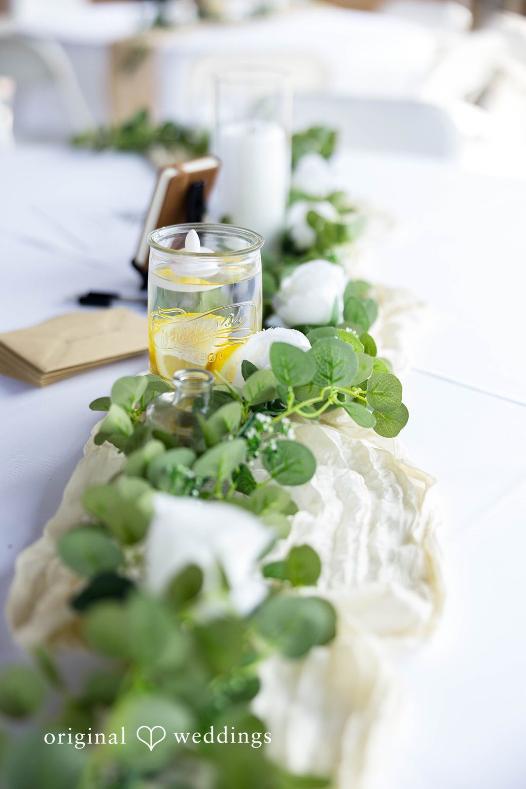 Ethan + Kelcy Bridal perfume and greenery details